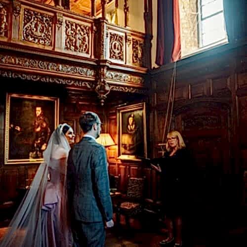 Couple being married in a unique indoor wedding ceremony space