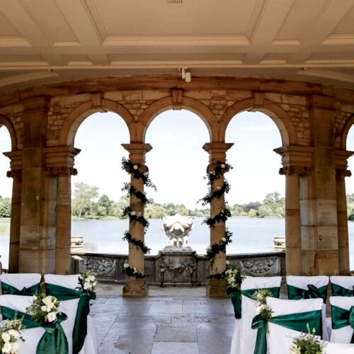 wedding ceremony space with arches