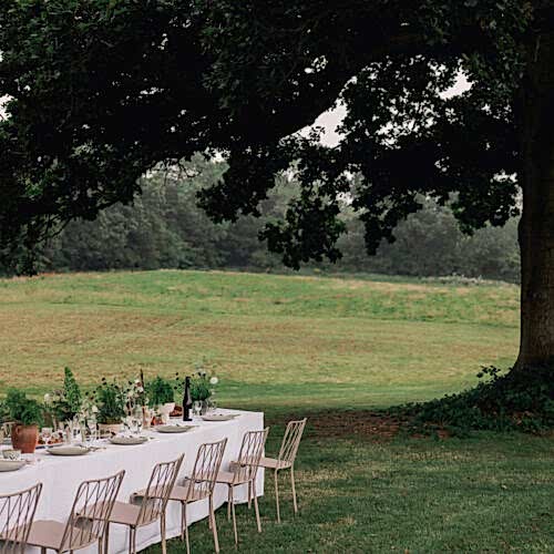 outdoor wedding dining space in gardens