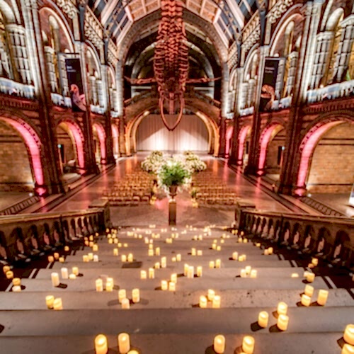 candlelit staircase leading to wedding ceremony space